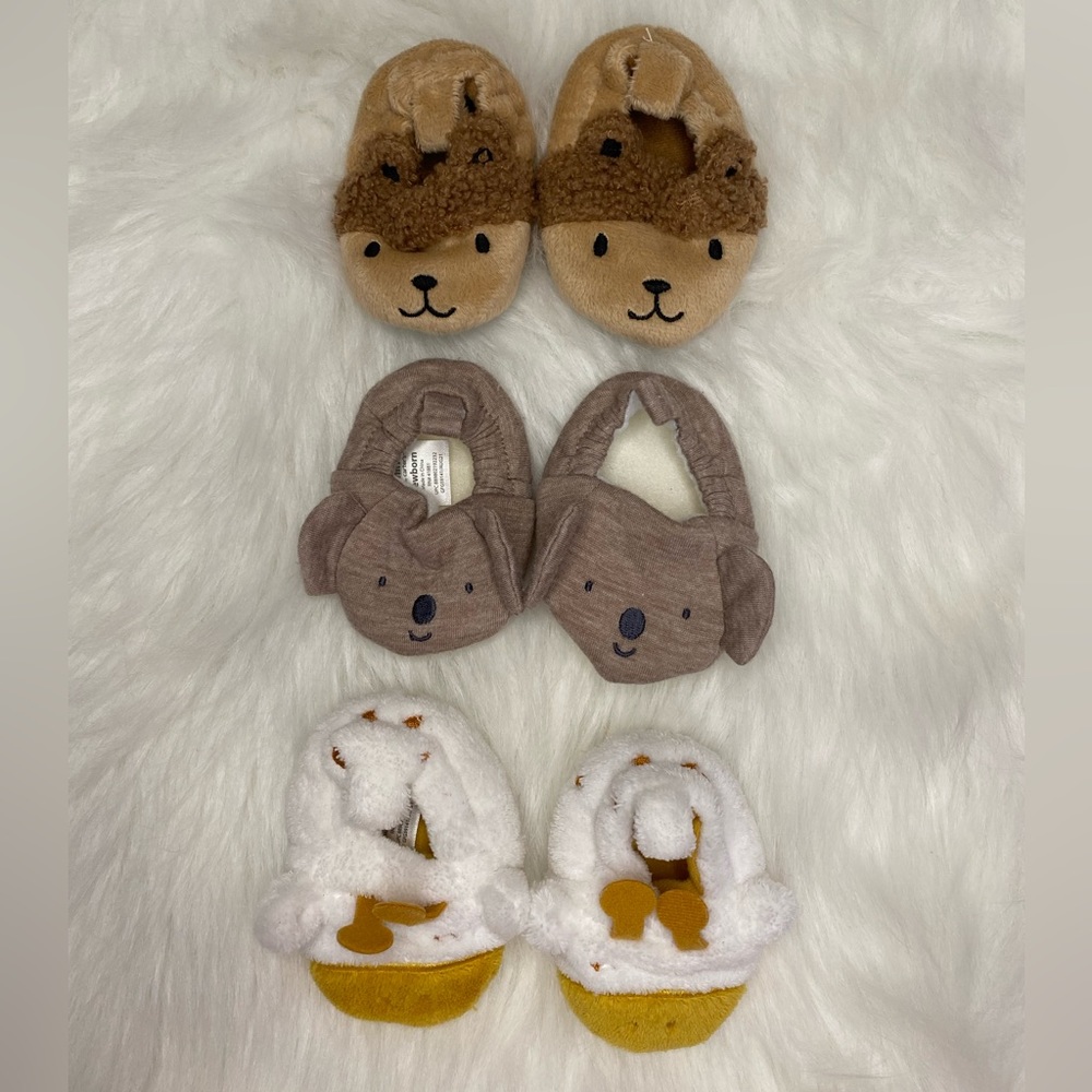 Baby unisex safari slippers, size newborn, gently used,no rips/stains